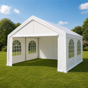 White outdoor event tent with arched window panels on a green lawn under a blue sky.